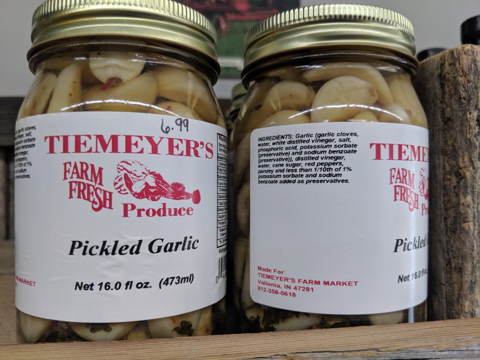 Cloves of Garlic in a jar salt and bulbs